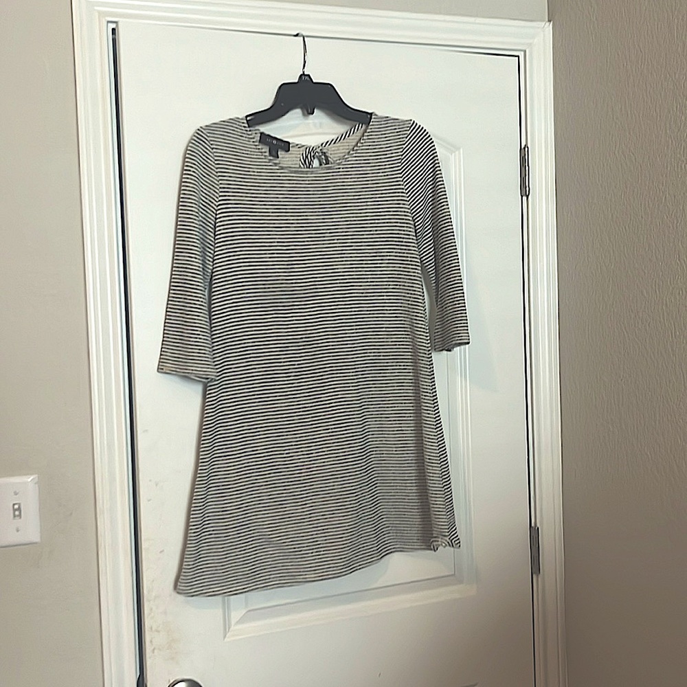 Cute women’s gray and white striped dress.